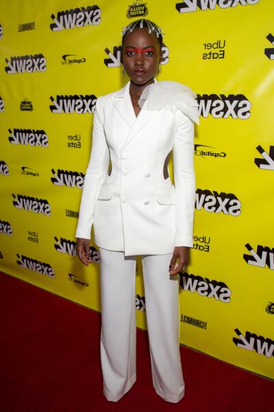 Actress Lupita Nyong’O attends the "US" movie premiere during the 2019 SXSW Conference and Festivals at the Paramount Theatre on March 8, 2019 in Austin, Texas. / AFP / SUZANNE CORDEIRO
