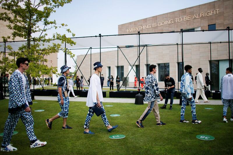 Models present looks from the Dolce & Gabbana Spring / Summer 2021 men's collection in a live-streamed show at the university campus of the Humanitas Research Foundation during Milan Digital Fashion Week. Reuters