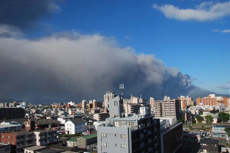 Smoke rises after an eruption of Mount Sakurajima in Kagoshima, southwestern Japan, in this handout photo taken and released by Kagoshima Local Meteorological Observatory August 18, 2013. The eruption on Sunday of the 1,117-metre (3665-feet) high volcano, one of Japan's most active volcanoes, sent up the highest plume in recorded history of about 5,000 metres (16,404 feet). It is also the volcano's 500th eruption this year, according to media reports citing the local meteorological observatory.    REUTERS/Kagoshima Local Meteorological Observatory/Handout via Reuters (JAPAN - Tags: ENVIRONMENT) ATTENTION EDITORS - NO SALES. NO ARCHIVES. FOR EDITORIAL USE ONLY. NOT FOR SALE FOR MARKETING OR ADVERTISING CAMPAIGNS. THIS IMAGE HAS BEEN SUPPLIED BY A THIRD PARTY. IT IS DISTRIBUTED, EXACTLY AS RECEIVED BY REUTERS, AS A SERVICE TO CLIENTS *** Local Caption ***  TOK105_JAPAN-_0818_11.JPG