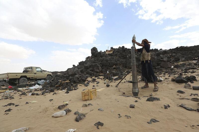 A pro-government fighter loads a mortar in Marib. Yemen’s government pulled out of UN-mediated peace talks with its Houthi adversaries on Sunday. REUTERS