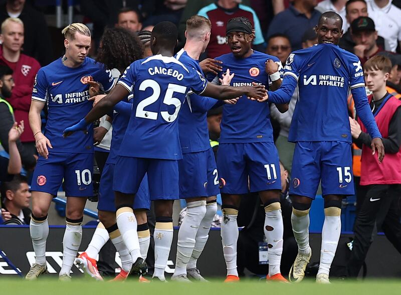 Chelsea's Noni Madueke, second right, celebrates after scoring. AFP