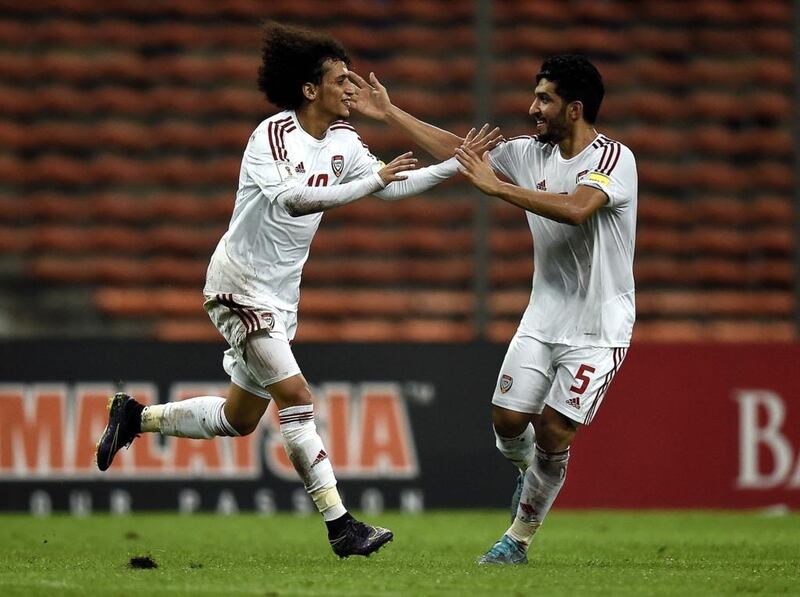 Amer Abdulrahman, right, will join UAE teammate and good friend Omar, left, at Al Ain ahead of the next Arabian Gulf League season. Manan Vatsyayana / AFP
