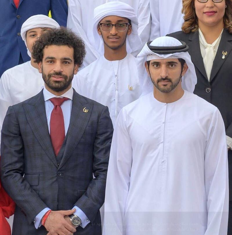 Sheikh Hamdan and Mo Salah, Egyptian football player for Liverpool FC, wear their wrist bands in support of the Special Olympics World Games. Courtesy Special Olympics World Games Abu Dhabi Twitter