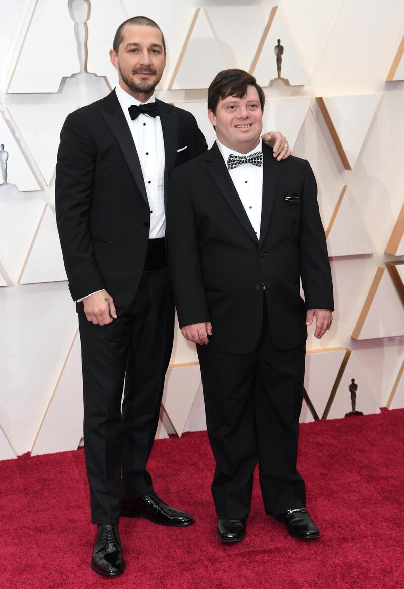 Shia LaBeouf and Zack Gottsagen arrive at the Oscars on Sunday, February 9, 2020, at the Dolby Theatre in Los Angeles. AP