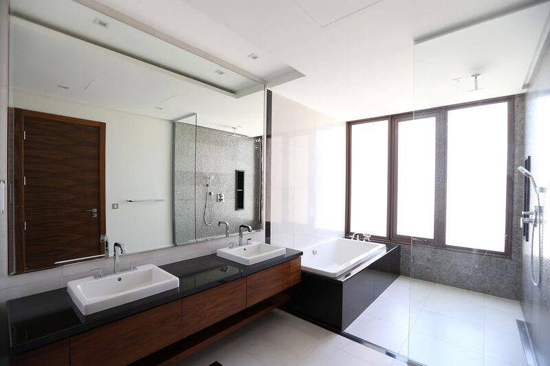 The bathroom in the type 8 four bedroom villa. Measuring 4,725 square feet on a 6,780 square foot plot it includes a reasonably sized garden and a barbecue deck. The bedrooms are all en-suite with a sizeable rain shower and wet room in the master bathroom and all the bedrooms include large built in cupboards. Pawan Singh / The National