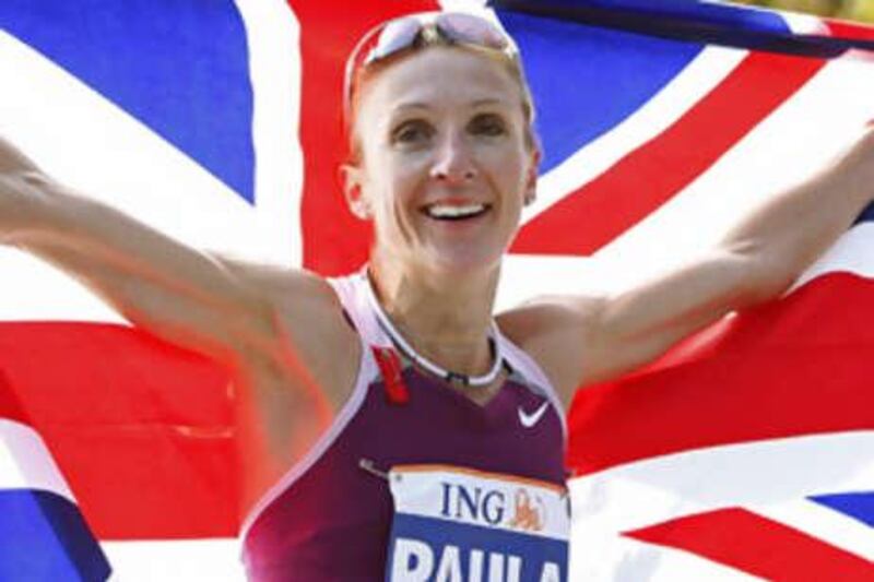 The New York Marathon winner Paula Radcliffe holds a Union Jack flag after winning her third title in the event.