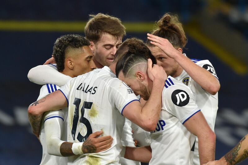 LEEDS, ENGLAND - DECEMBER 16: Stuart Dallas of Leeds United celebrates with teammates after scoring their team's third goal  during the Premier League match between Leeds United and Newcastle United at Elland Road on December 16, 2020 in Leeds, England.The match will be played without fans, behind closed doors as a Covid-19 precaution.  (Photo by Rui Vieira - Pool/Getty Images)