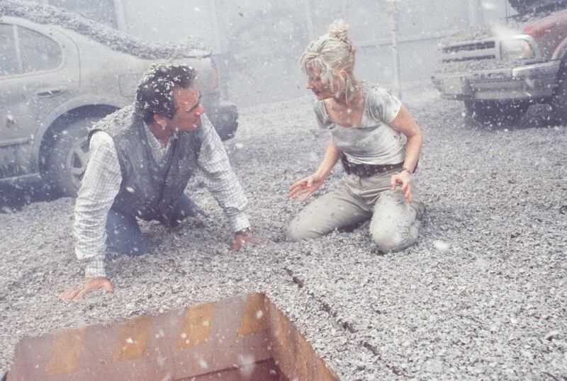 Tommy Lee Jones and Anne Heche in 1997 film 'Volcano'. Getty Images