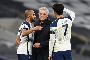 Lucas Moura, left, and Son Heung-min are congratulated by Totte ham manager Jose Mourinho after the Premier League win over Manchester City. Reuters