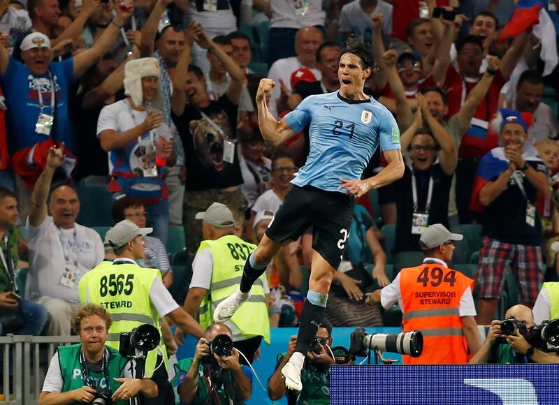 Uruguay's Edinson Cavani celebrates after scoring his second goal during the round of 16 match between Uruguay and Portugal at the 2018 soccer World Cup at the Fisht Stadium in Sochi, Russia, Saturday, June 30, 2018. (AP Photo/Francisco Seco)