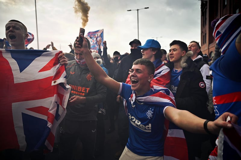 Rangers fans gather at Ibrox stadium to celebrate the club winning the Scottish Premiership for the first time in 10 years. Getty