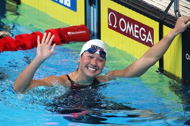 Siobhan Bernadette Haughey of Hong Kong celebrates after winning the Women's 200m Freestyle final at the 15th FINA World Swimming Championships (25m), Abu Dhabi, United Arab Emirates, 16 December 2021.   EPA / ALI HAIDER