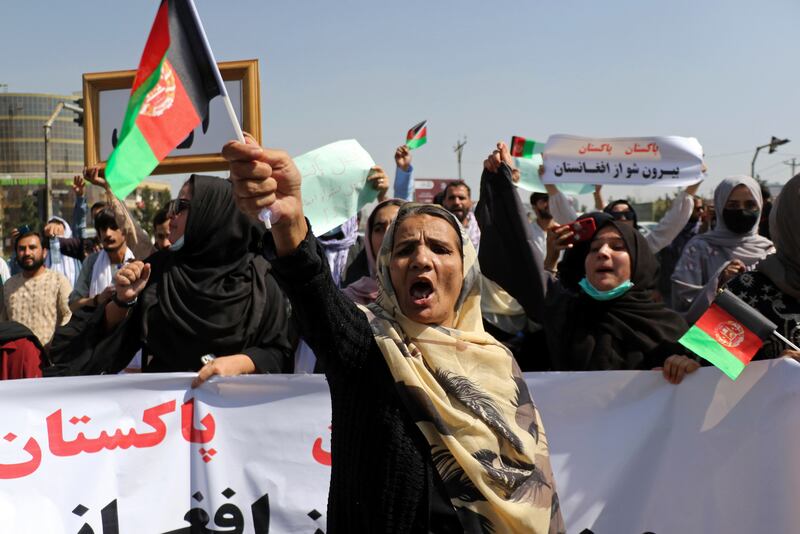 The demonstration took place near the Pakistan embassy in Kabul.  The sign in Farsi reads: "Pakistan, Pakistan, get out of Afghanistan". AP Photo