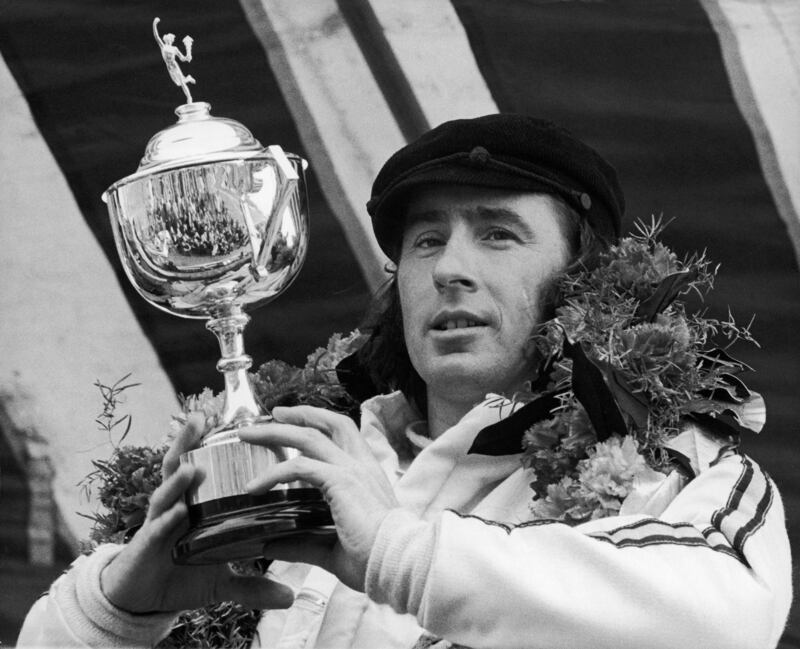 3 wins - Jackie Stewart (1969, 1971, 1973): The British driver sealed his first title with Matra-Ford by 26 points over Jacky Ickx. He won his other two titles with Tyrrell - the first ahead of Ronnie Peterson by 29 points, then Emerson Fittipaldi by 16. Getty.