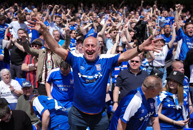 Ipswich Town supporters celebrate their side’s first goal. PA