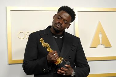 Daniel Kaluuya, winner of Best Actor in a Supporting Role for 'Judas and the Black Messiah,' poses with his Oscar at the 93rd Academy Awards. AP