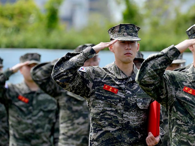 Son Heung-min salutes during a basic military training completion ceremony at a Marine Corps boot camp in Seogwipo on Jeju Island.