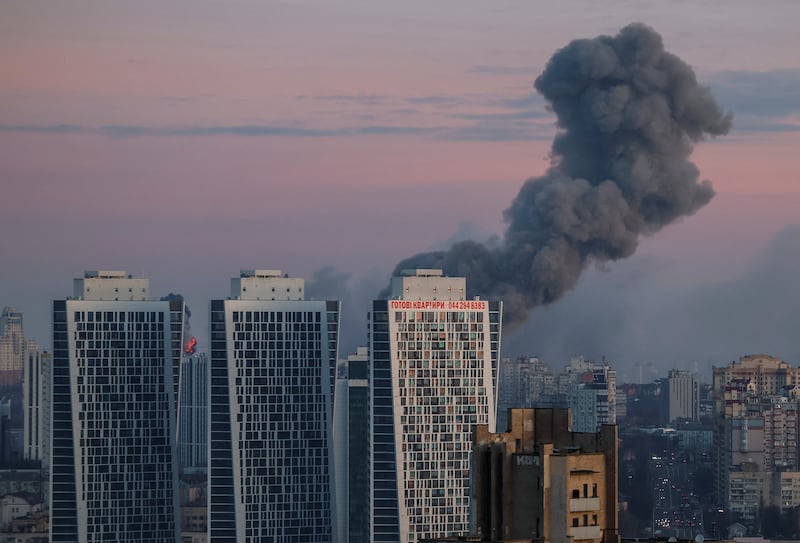 Smoke rises over Kyiv, one of several cities hit in the attack. Reuters