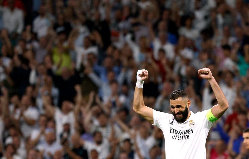 Real Madrid's Karim Benzema celebrates their first goal, scored by Rodrygo, in the 2-1 Champions League win against Shakhtar Donetsk on October 5. Reuters