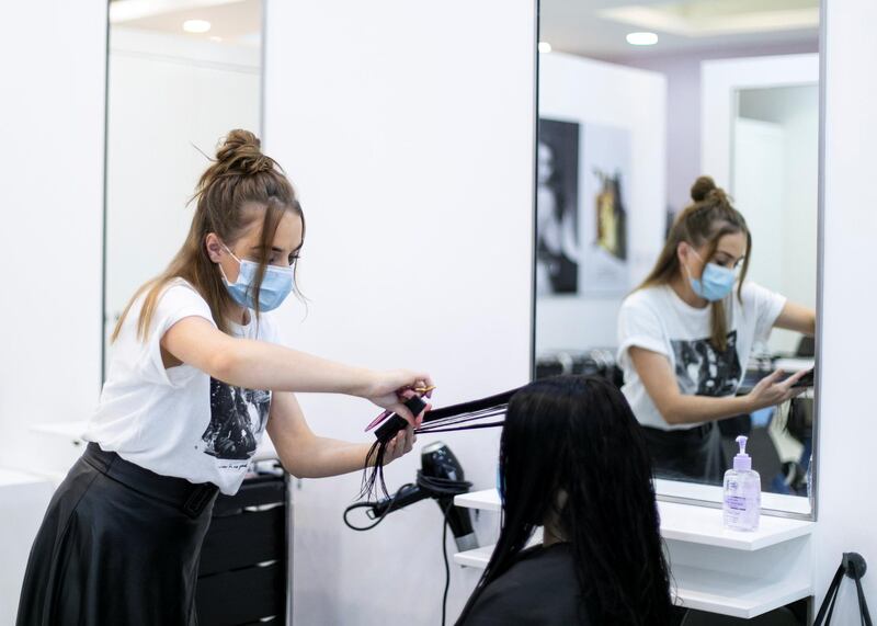 DUBAI, UNITED ARAB EMIRATES. 21 MAY 2020. 
A client gets her hair done at Pastels Salon in Mercato.
(Photo: Reem Mohammed/The National)

Reporter:
Section: