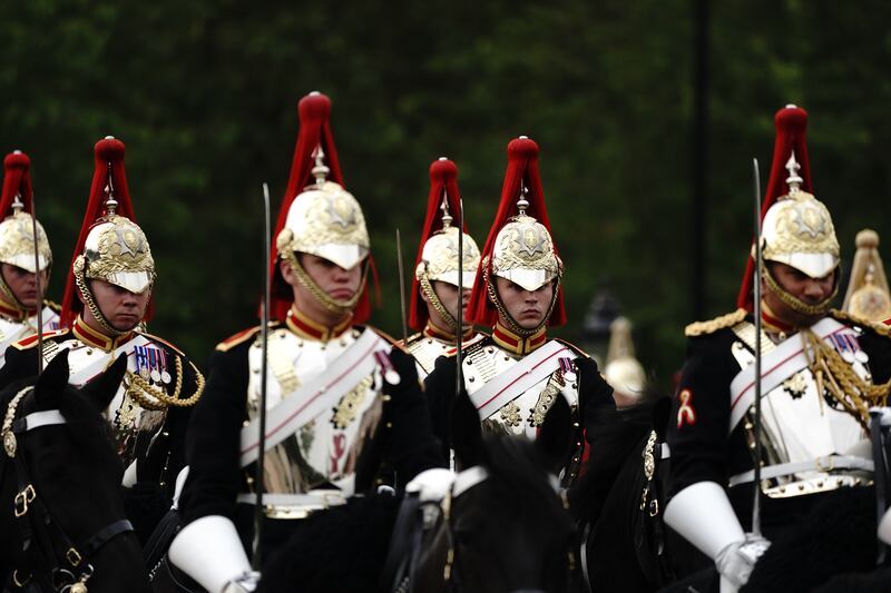 Members of the Household Cavalry on The Mall before  Trooping the Colour. PA