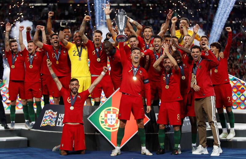 Cristiano Ronaldo lifts the Nations League trophy after Portugal beat the Netherlands in the final. Reuters