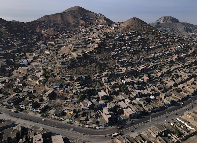 Homes blanket the hills in the Villa Maria shanty town of Lima, Peru. AP