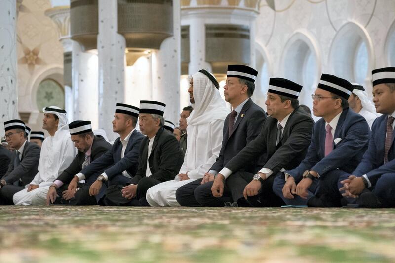ABU DHABI, UNITED ARAB EMIRATES - June 14, 2019: HH Sheikh Mohamed bin Zayed Al Nahyan, Crown Prince of Abu Dhabi and Deputy Supreme Commander of the UAE Armed Forces (5th R) and HM King Sultan Abdullah Sultan Ahmad Shah of Malaysia (6th R), attend Friday prayers at the Sheikh Zayed Grand Mosque. Seen with members of the Malaysian delegation.

( Hamad Al Kaabi / Ministry of Presidential Affairs )​
---