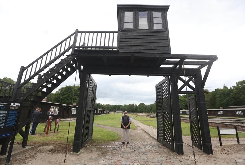 FILE - In this July 18, 2017 file photo, the wooden main gate leads into the former Nazi German Stutthof concentration camp in Sztutowo, Poland. (AP Photo/Czarek Sokolowski, file)