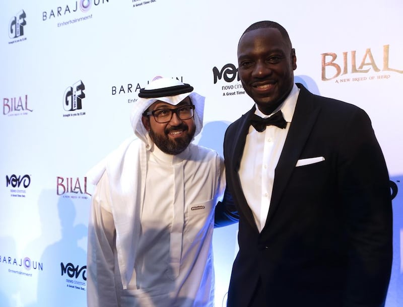Ayman Jamal, left, producer and co-director of Bilal, and actor Adewale Akinnuoye-Agbaje, at the  film’s premiere in Dubai on Sunday. Jeffrey E Biteng / The National