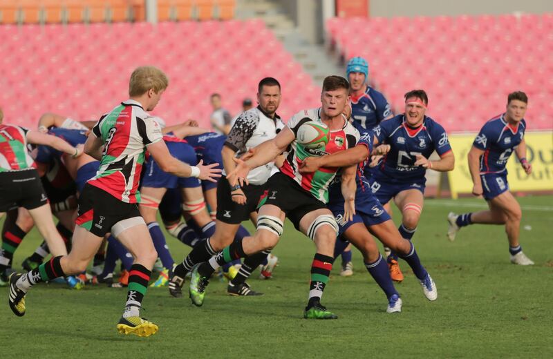 Dubai,UAE, April 7, 2017,  Abu Dhabi Harlequins (red and green) VS. Jebel Ali Dragons (Blue) Premiership final.
Victor Besa for The National
ID: 38294
Reporter:  Paul Radley
Sports *** Local Caption ***  VB_040717_sp-rugby-2.jpg