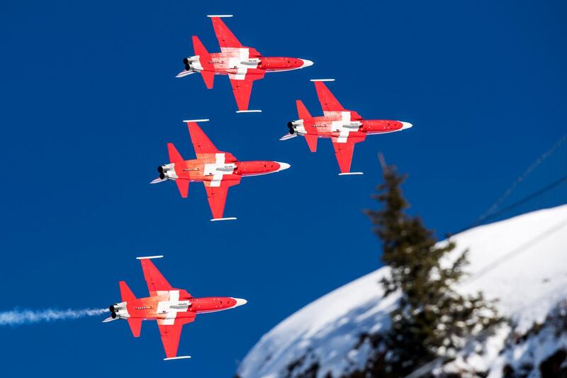 The Swiss Air Force Patrouille Suisse aerobatic team performs during the men's downhill race at the Alpine Skiing FIS Ski World Cup in Wengen, Switzerland.  EPA
