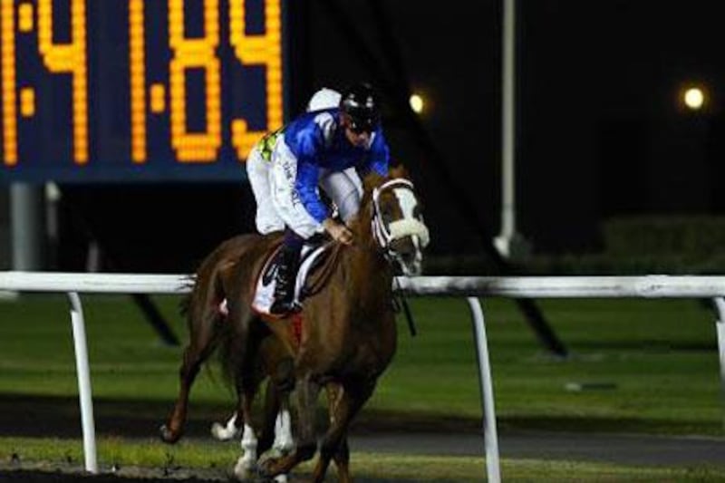 Dane O'Neill enjoys the ride aboard Quite A Show in winning the featured event at Meydan Racecourse on Thursday night, the Mazrat Al Ruwayah..