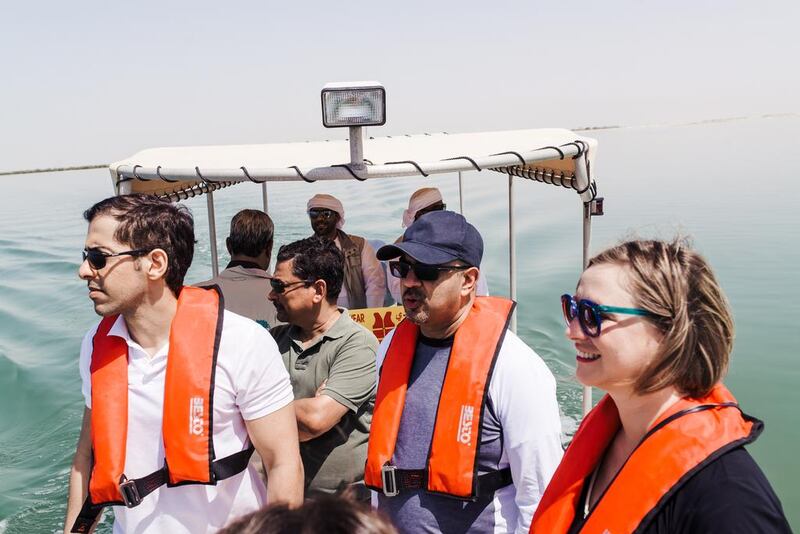 From left: Mohammed Al Otaiba, The National’s Editor-in-Chief, Arif Lalani, Canada’s ambassador to the UAE, and Laura Koot, The National’s Managing Editor, on a boat tour of the mangroves.