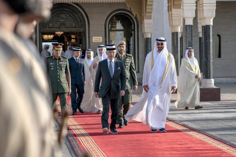 ABU DHABI, UNITED ARAB EMIRATES - June 14, 2019: HH Sheikh Mohamed bin Zayed Al Nahyan, Crown Prince of Abu Dhabi and Deputy Supreme Commander of the UAE Armed Forces (center R) bids farewell to HM King Sultan Abdullah Sultan Ahmad Shah of Malaysia (center L), at the Presidential Airport.

( Hamad Al Kaabi / Ministry of Presidential Affairs )​
---