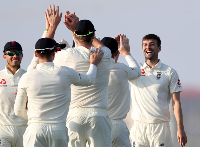 Abu Dhabi, United Arab Emirates - November 18, 2018: England's Mark Wood takes the wicket of Pakistan's Shan Masood in the game between Pakistan A and the England Lions. Sunday the 18th of November 2018 at the Nursery Oval, Zayed cricket stadium, Abu Dhabi. Chris Whiteoak / The National