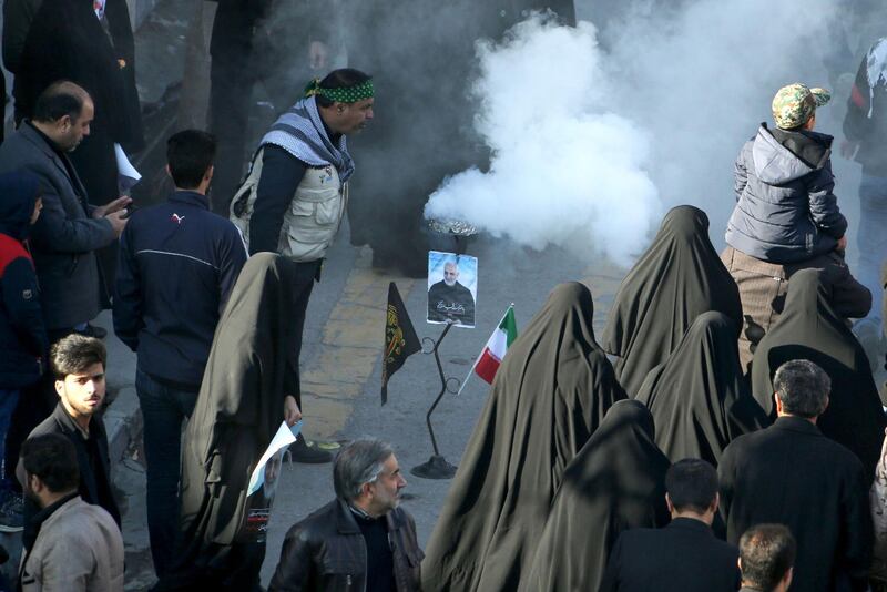 An Iranian mourner burns incense during the final stage of funeral processions for slain top general Qassem Suleimani, in his hometown Kerman. AFP