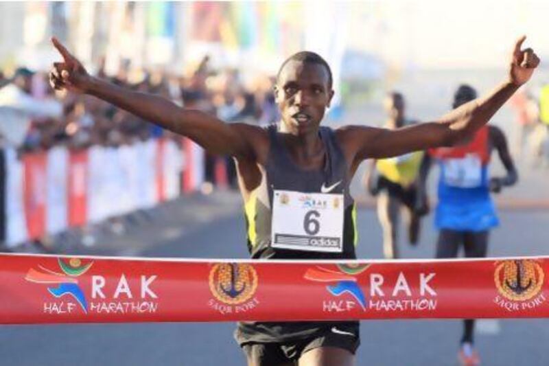 Geoffrey Kipsang of Kenya surged ahead at the 15-kilometre mark to win the men's division of the 2013 RAK Half Marathon.