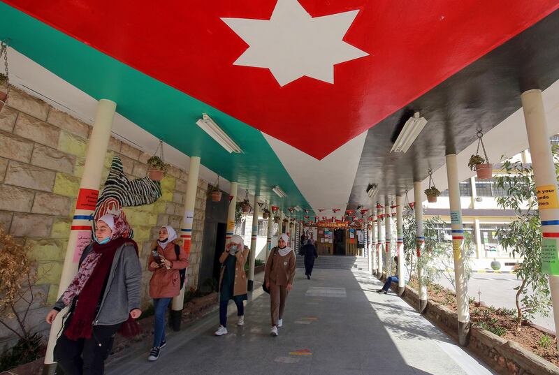 Jordanian pupils return to school for the first time in nearly a year, in the capital Amman. AFP