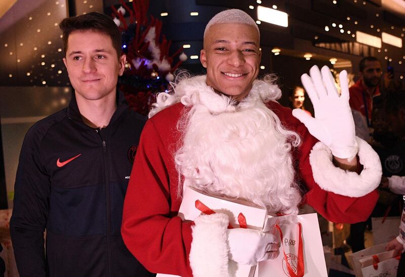 Ander Herrera and Kylian MBappe. AFP