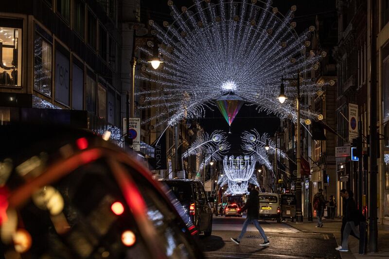 Christmas lights hang on a side street of Oxford Street. Getty Images