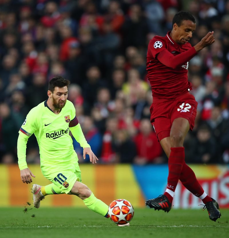 LIVERPOOL, ENGLAND - MAY 07:  Lionel Messi of Barcelona takes on Joel Matip of Liverpool during the UEFA Champions League Semi Final second leg match between Liverpool and Barcelona at Anfield on May 07, 2019 in Liverpool, England. (Photo by Clive Brunskill/Getty Images)
