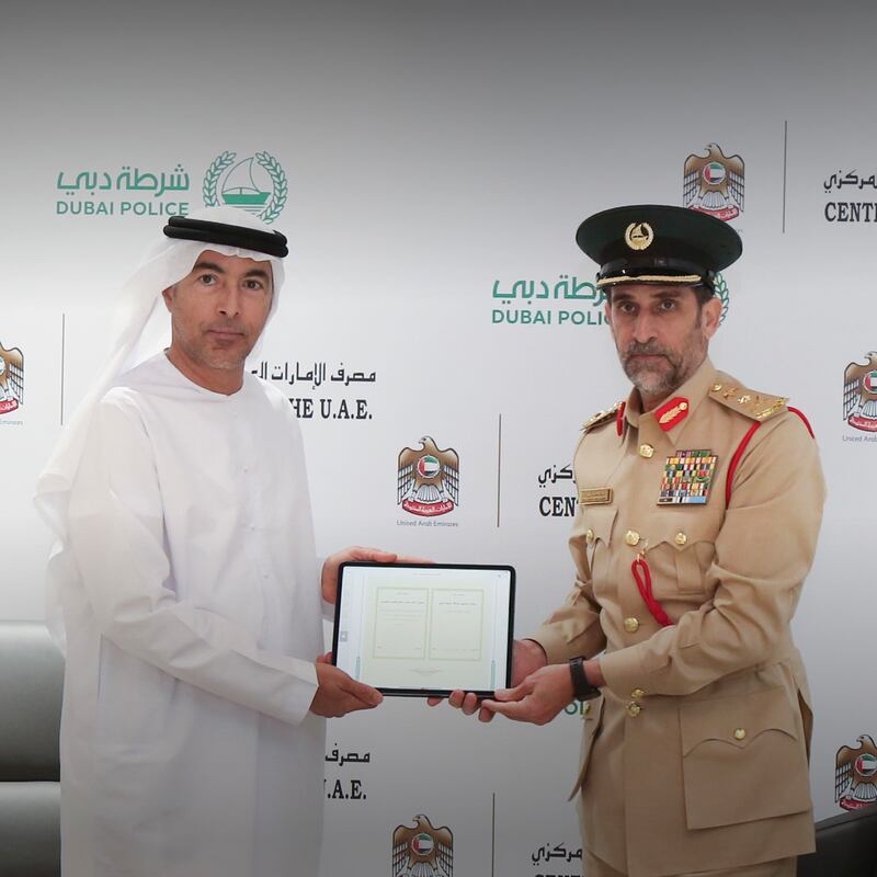 The UAE Central Bank the Dubai Police signed a pact to promote co-ordination on information exchange related to financial crimes. Photo: UAE Central Bank