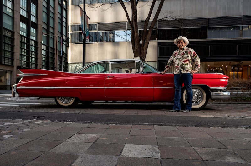 Hiroyuki Wada with a 1959 Cadillac Coupe DeVille. AFP
