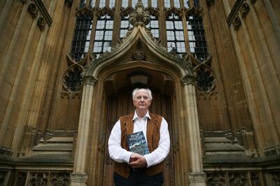British author Philip Pullman poses with his new book 'La Belle Sauvage: The Book of Dust Volume One' during a photo call at the Bodleian Libraries, in Oxford, southern England, on October 18, 2017.
The 17-year wait for a return to the mystical world of British author Philip Pullman's "Dark Materials" series will end on October 19 with the release of "La Belle Sauvage", the first volume of a new trilogy. / AFP PHOTO / Daniel LEAL-OLIVAS