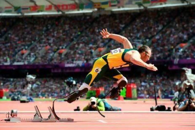 South African double amputee Oscar Pistorius takes the start of the men's 400m heats during the London 2012 Paralympic Games.