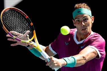 Spain's Rafael Nadal hits a return against Marcos Giron of the US during their men's singles match on day one of the Australian Open tennis tournament in Melbourne on January 17, 2022.  (Photo by Brandon MALONE  /  AFP)  /  -- IMAGE RESTRICTED TO EDITORIAL USE - STRICTLY NO COMMERCIAL USE --