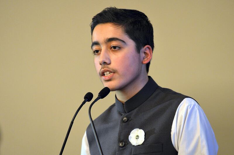 One of the victims of the Peshawar school massacre Ahmad Nawaz speaks at an event to commemorate the massacre in Birmingham, north England on December 14, 2015. On December 16, 2014 Taliban gunmen coldly slaughtered more than 150 people, most of them children, at an army-run school in Peshawar.  AFP PHOTO / PAUL ELLIS (Photo by PAUL ELLIS / AFP)