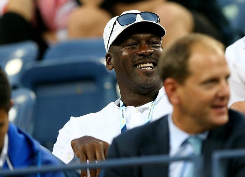 Michael Jordan watches Roger Federer during his match against Marinko Matosevic at the US Open in New York City on Tuesday. Elsa / Getty Images / August 26, 2014 