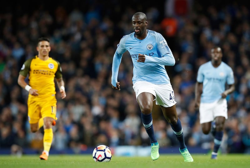 Manchester City's Yaya Toure coin action during the game. Martin Rickett / AP Photo